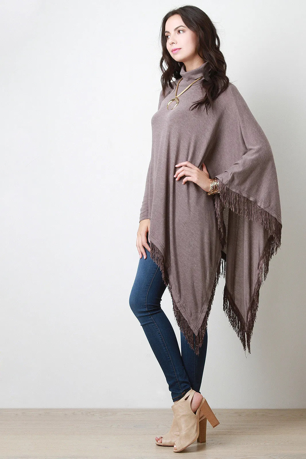 Fringed Turtle Neck Poncho Sweater