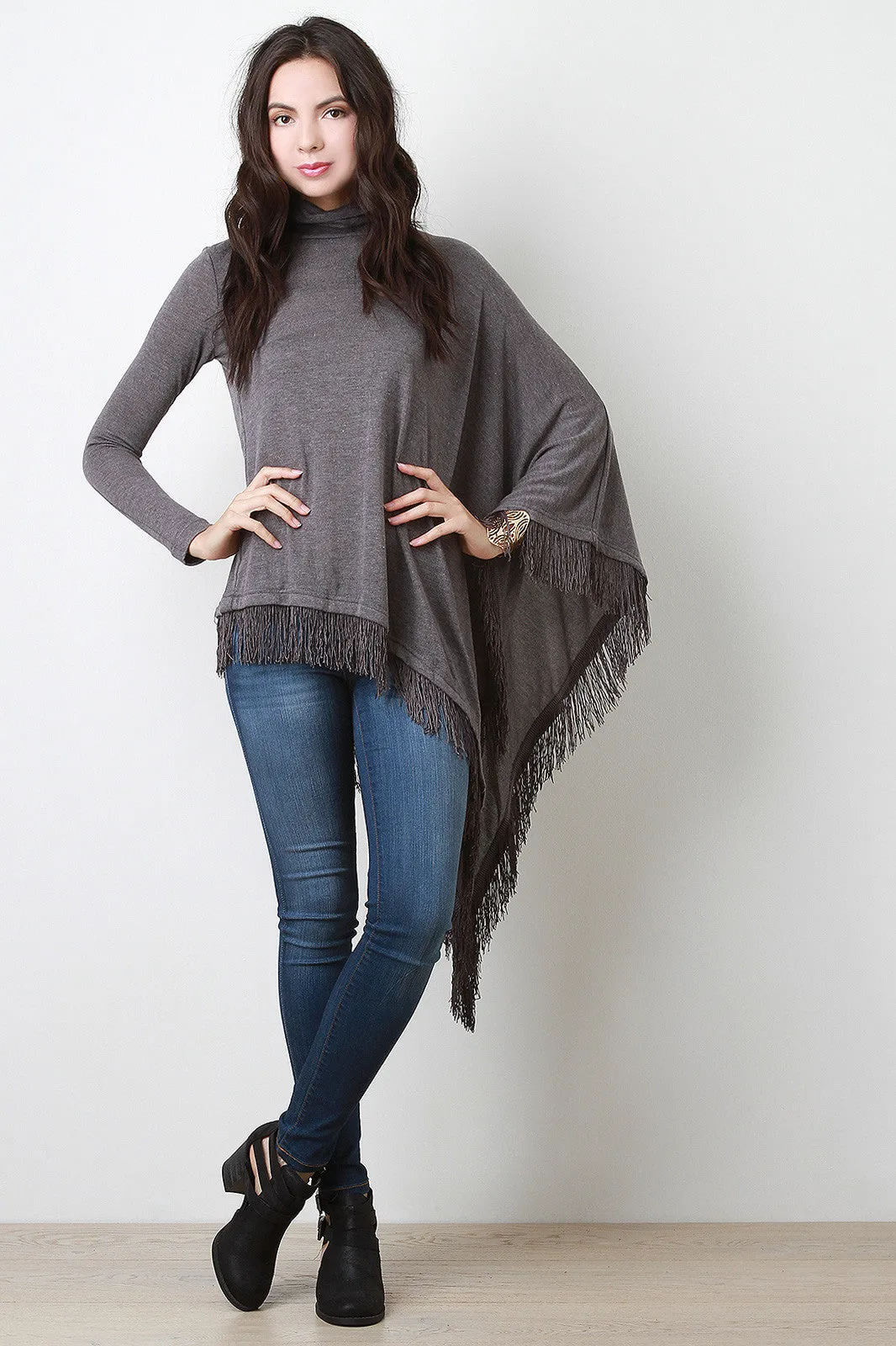 Fringed Turtle Neck Poncho Sweater